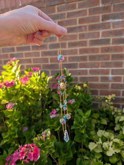 Holding up a finished sun catcher